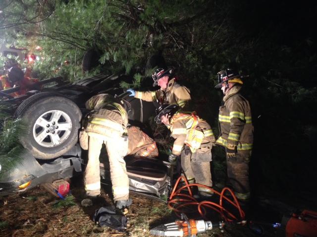 Crews work to free the trapped driver of this truck along Providence Road - March 2014