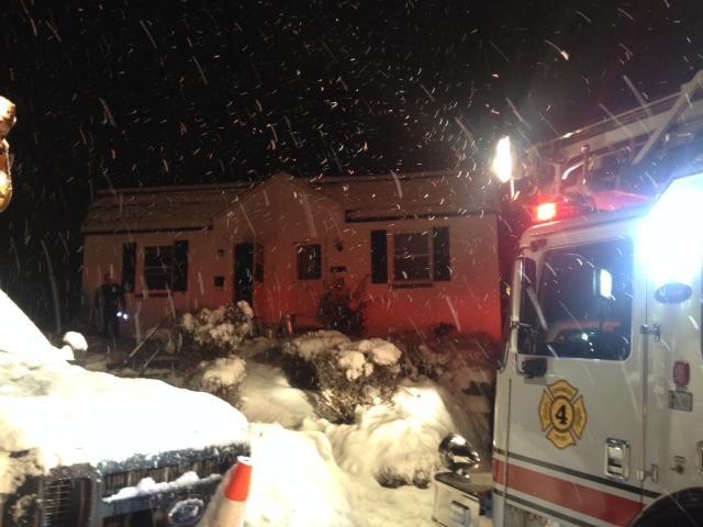 Ladder 4 investigates smoke in a dwelling during this snow storm - February 2014